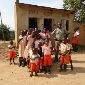 Happy Ivan and The Ntungamo Parents School children